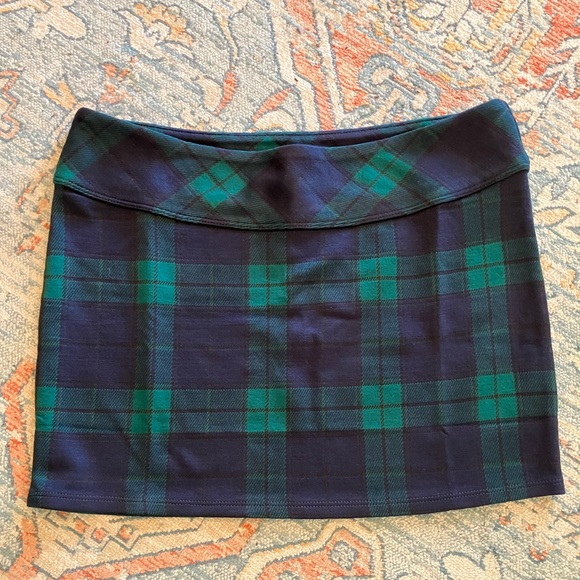 H&M mini skirt. Dark blue/green plaid. Size small. - Picture 1 of 3